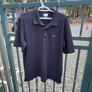 5-2026. Greg Norman Collection Black Polo with Multicolor Shark Logo. XL